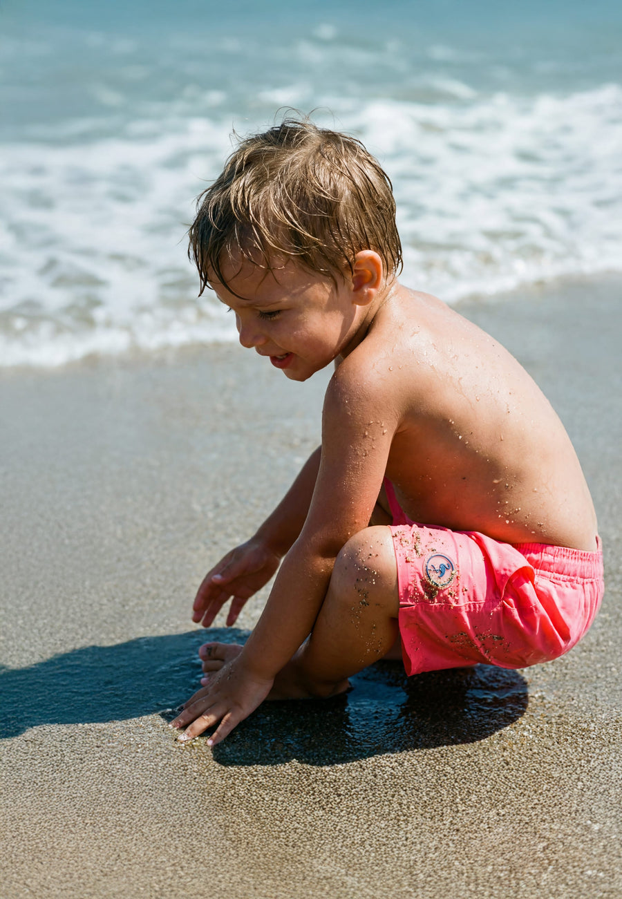 Bañador para niños Calypso con Pantone coral rosa