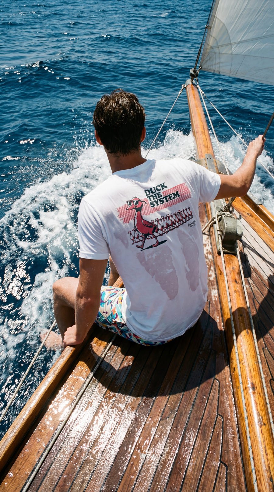 Camiseta Duck the System estampado pato líder rosa
